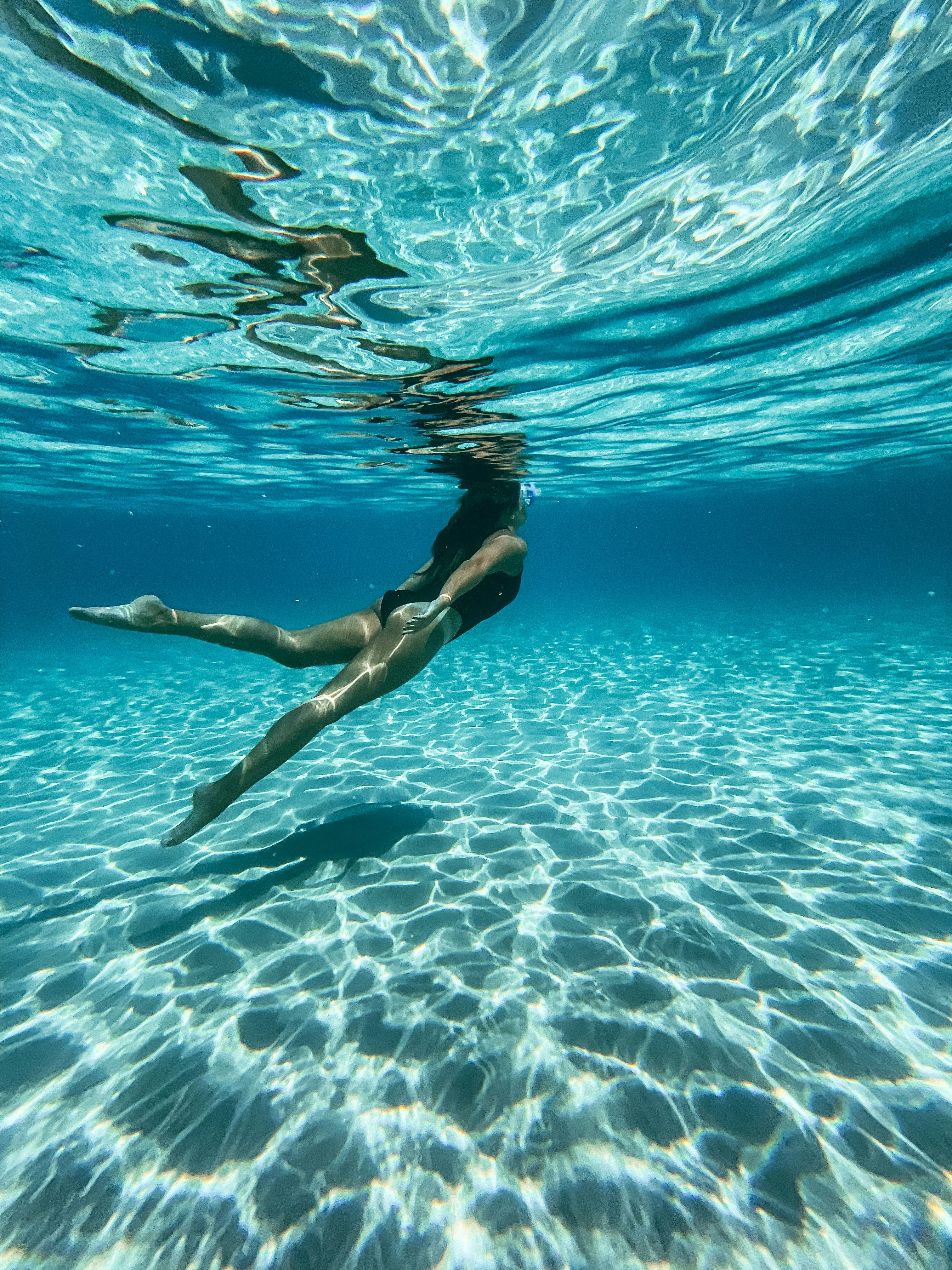 woman swimming in sea