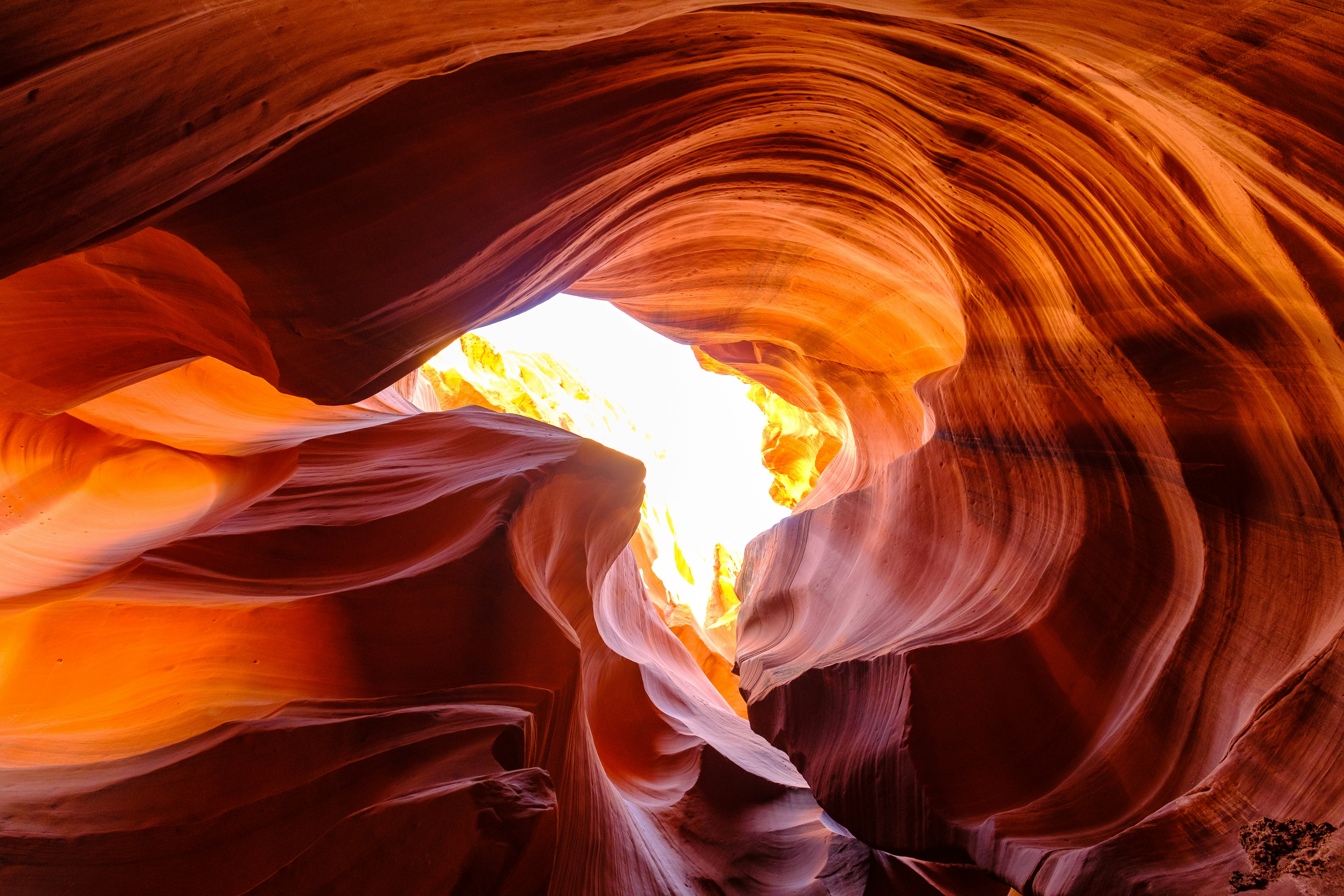 Nature produces the most astoundingly beautiful images: the swirling lava of a volcano, palm trees against a blue sky, snow-capped mountains towering above. Unsplash has magnificent , high-quality photos of all the delights that nature has to offer.