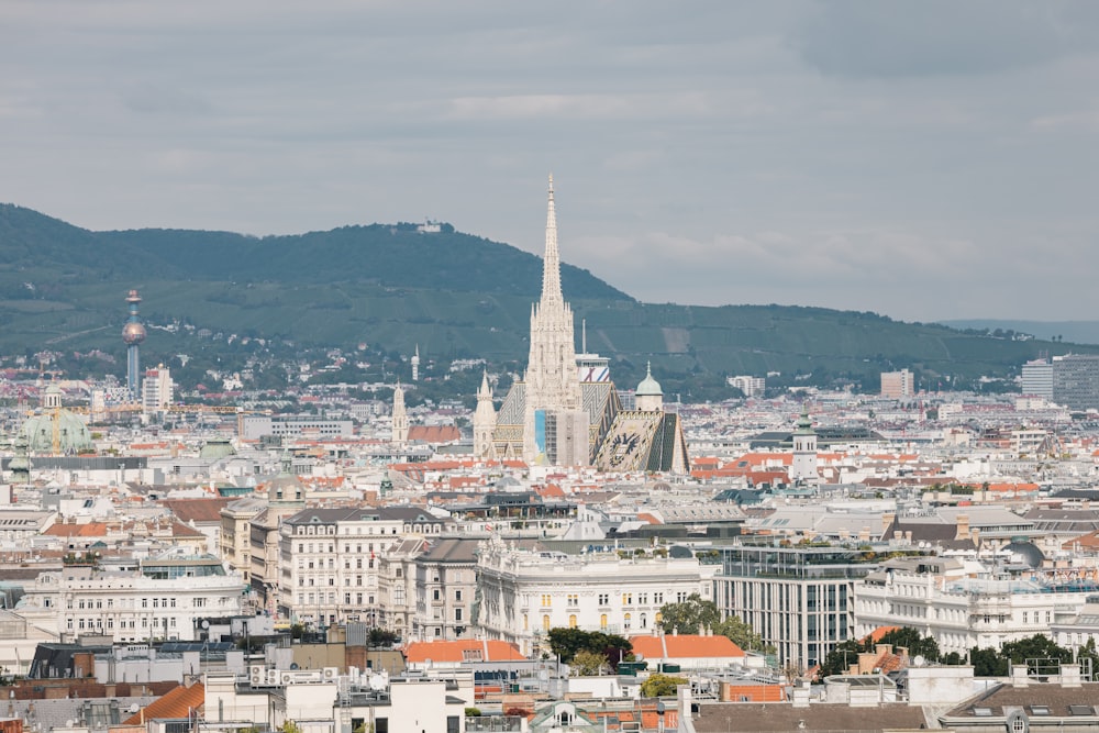 a city with a mountain in the background