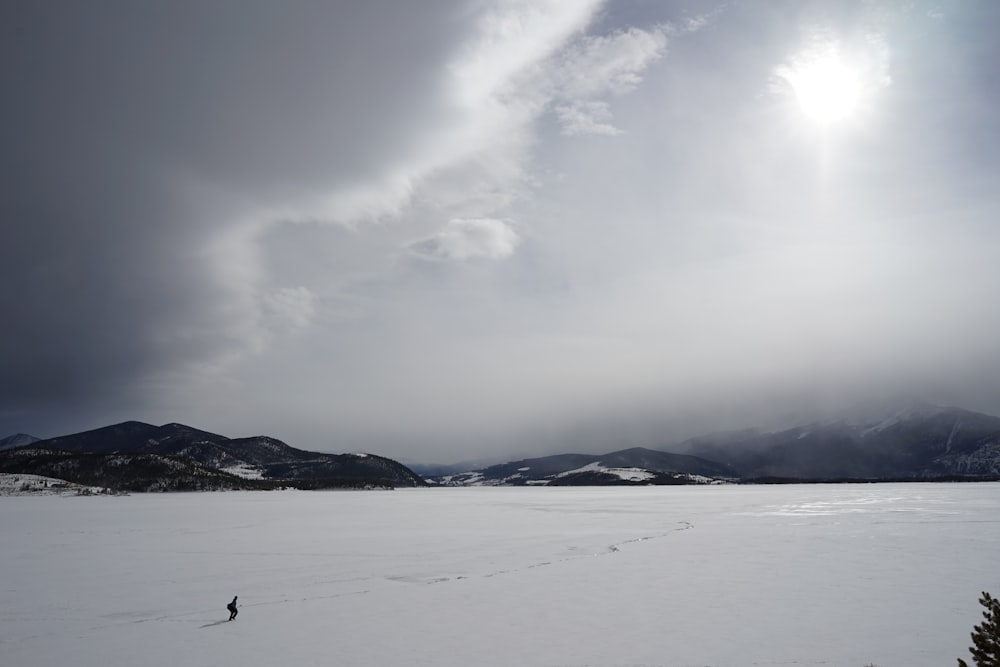 a person skiing on the snow