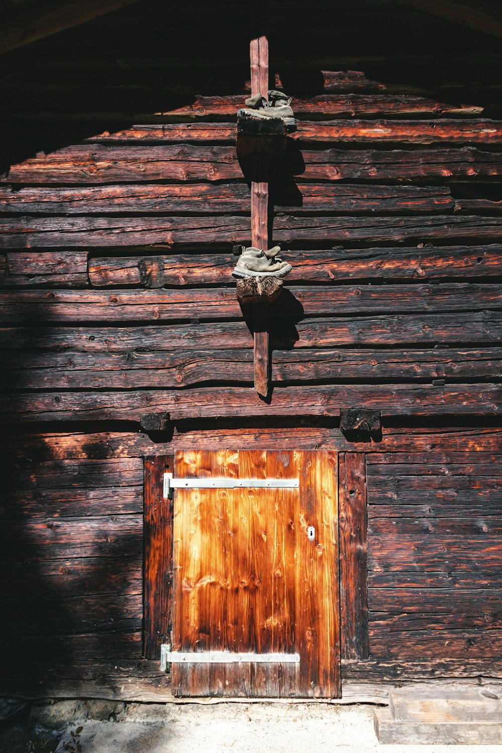 a wooden door with a metal handle
