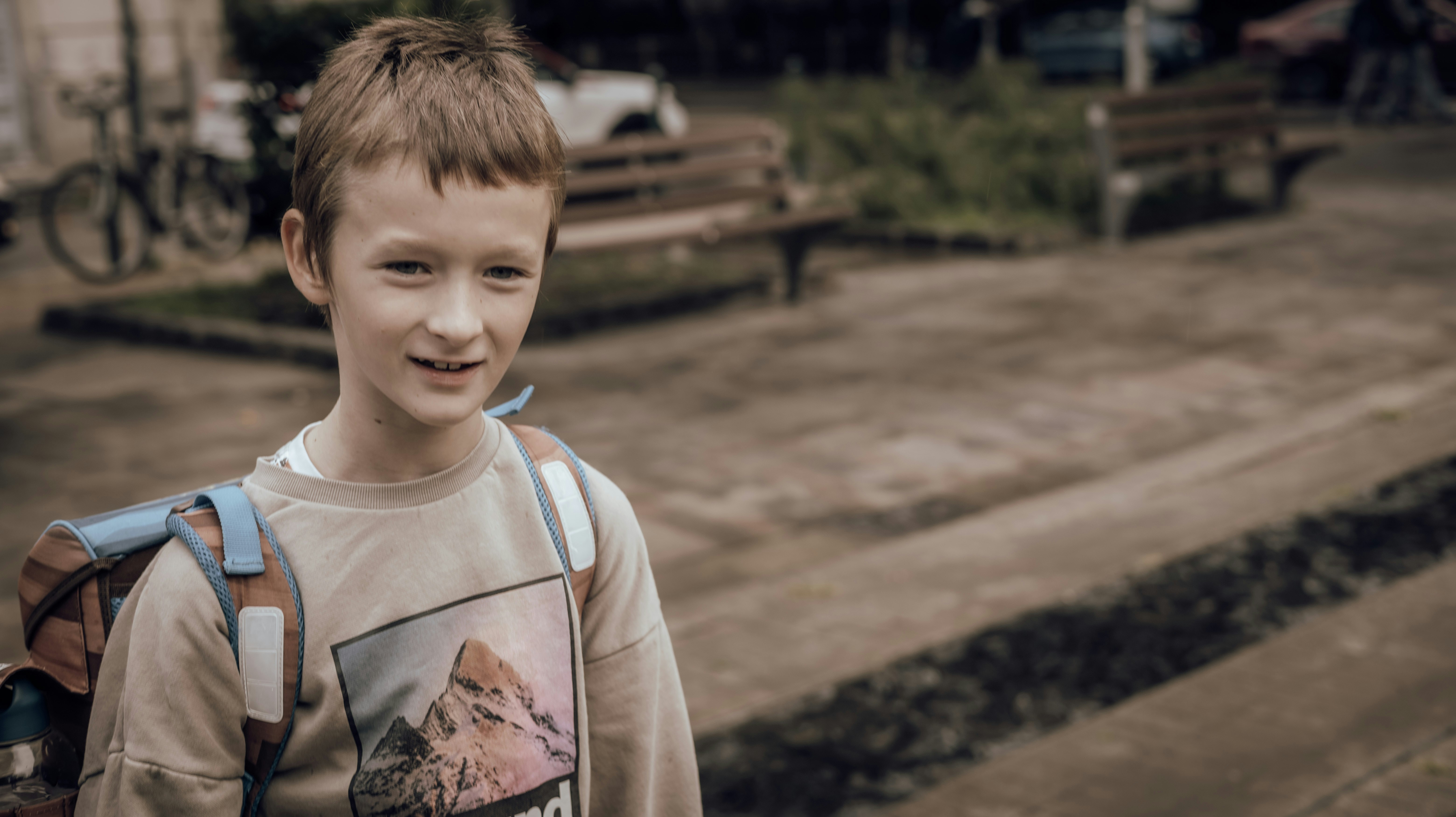 a boy with a backpack
