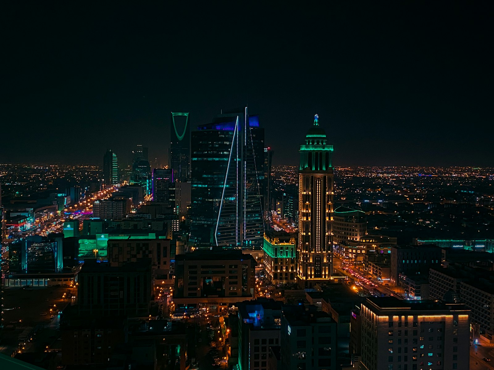 Saudi city skyline at night, representing KSA project supply coverage