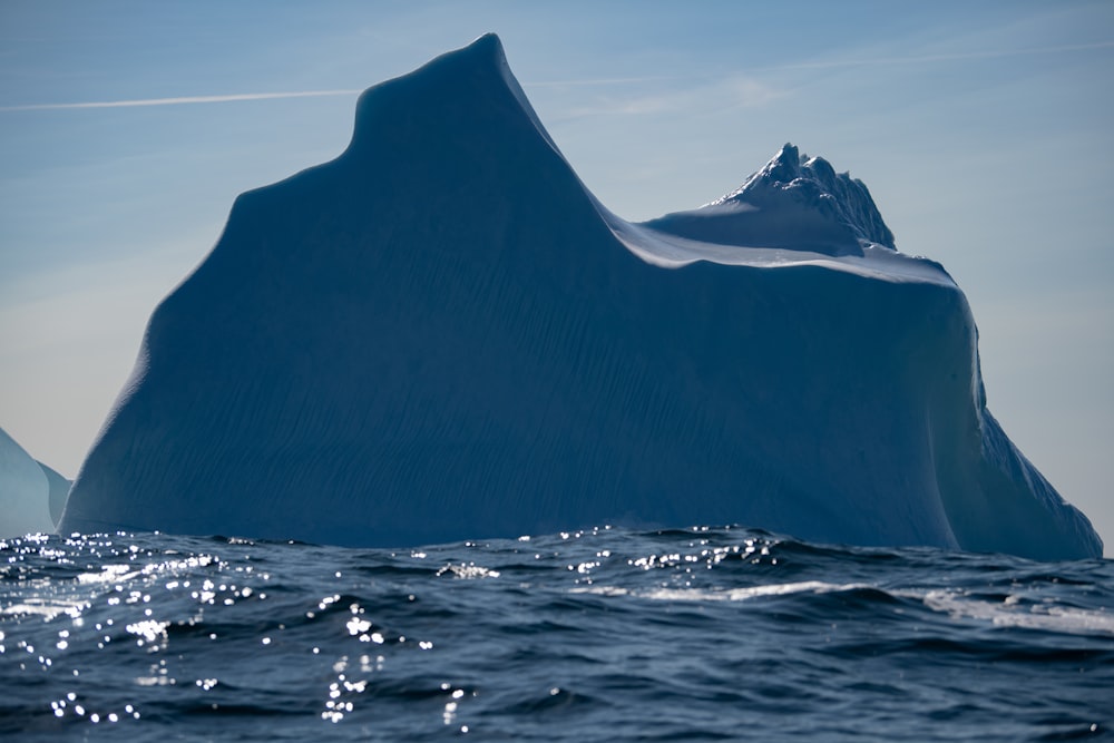 a large iceberg in the ocean