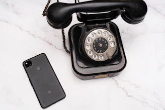 a pair of black telephones