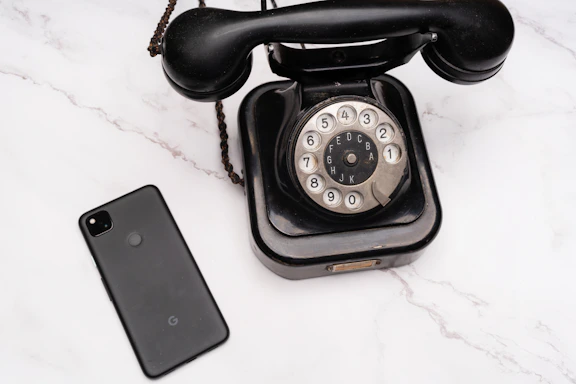 a pair of black telephones