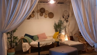 Cozy corner with soft cushions and calming decor for wellness activities.