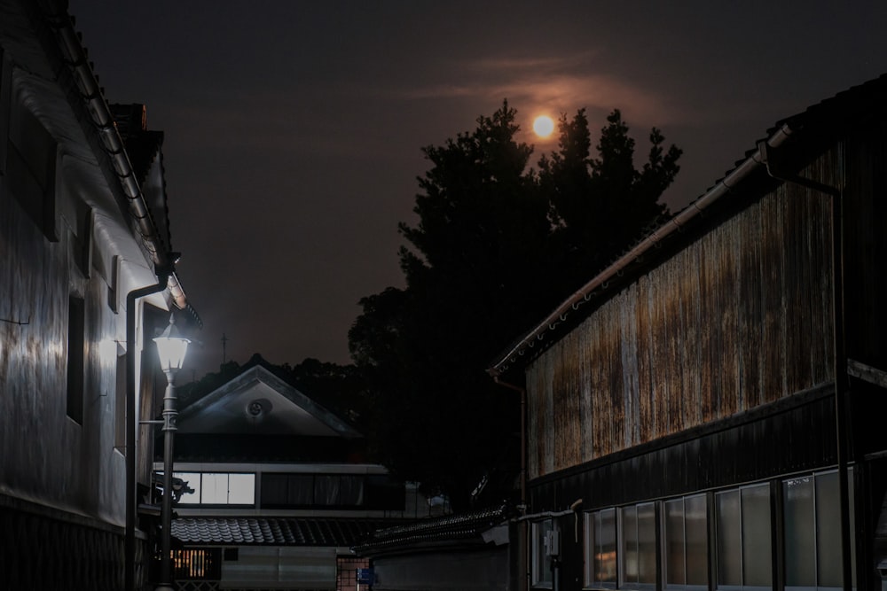 a street light and buildings at night