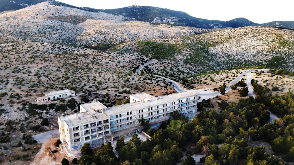 a large building in a wooded area