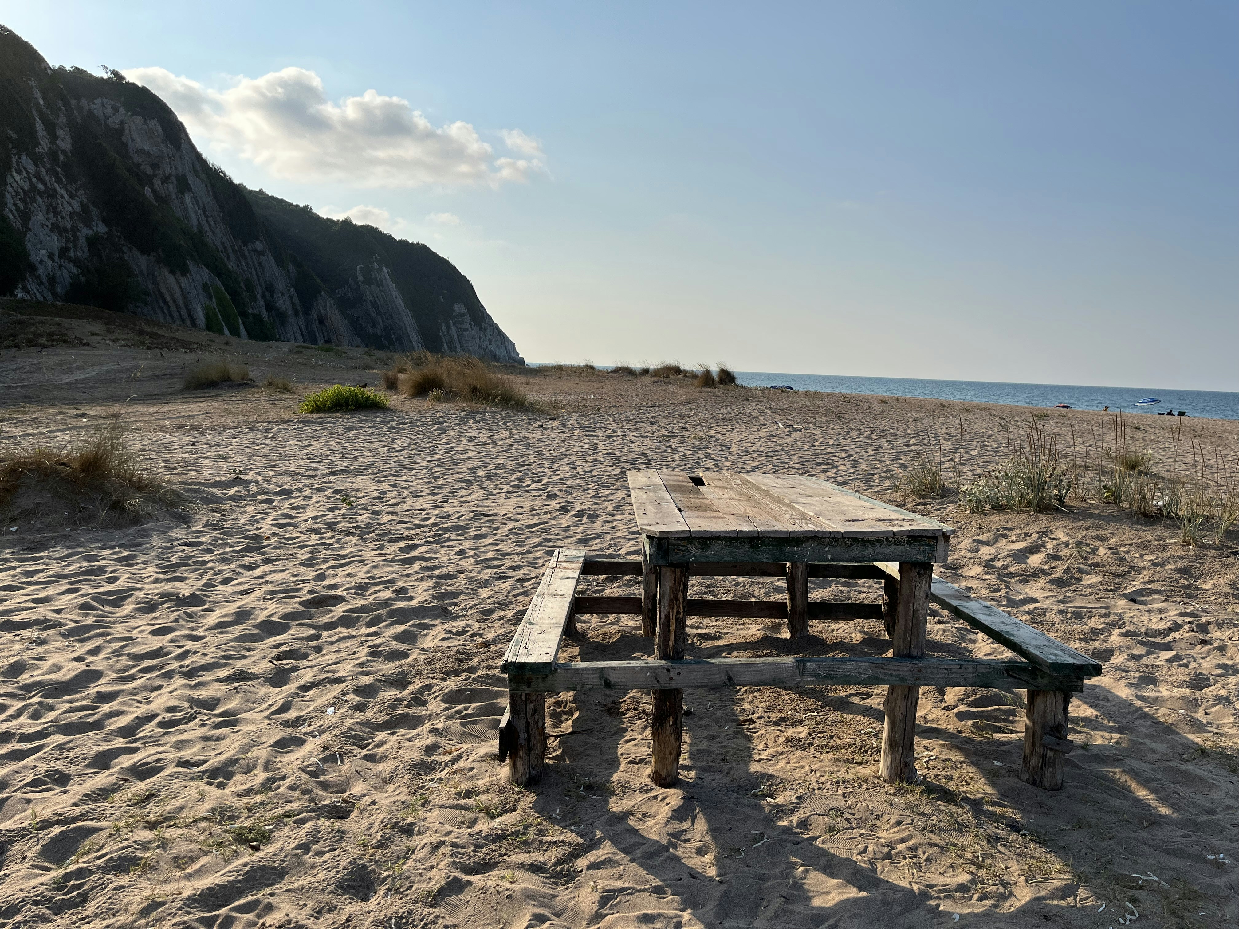 a picnic table on a beach