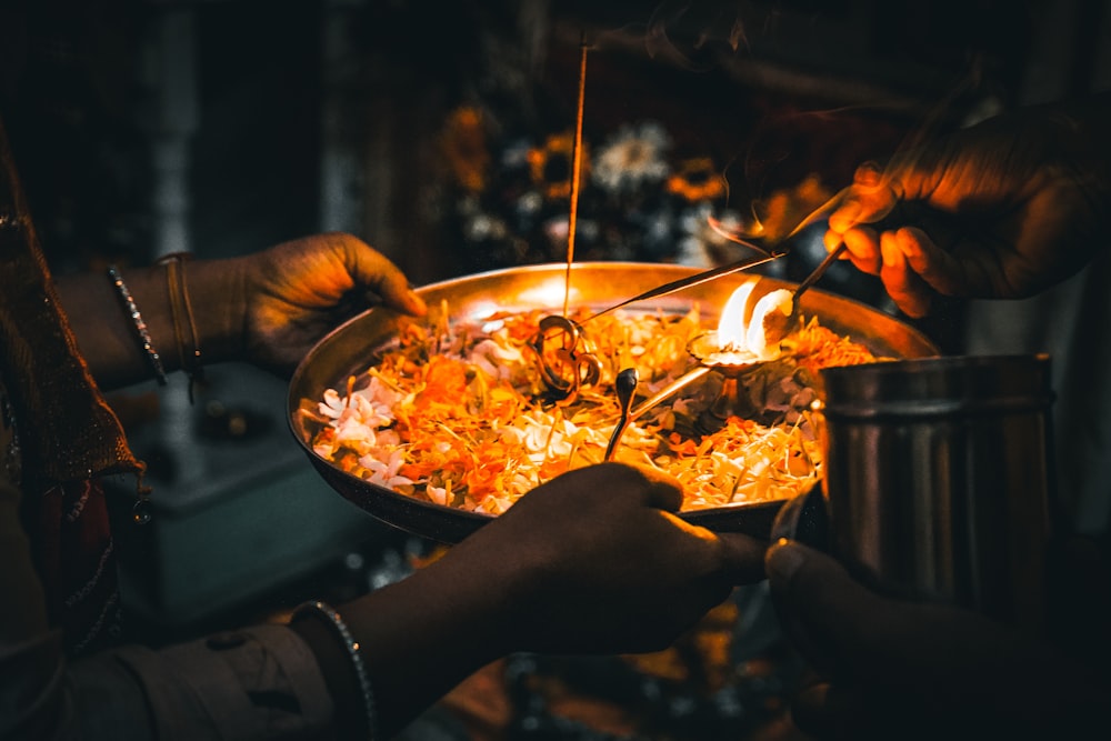 a group of people holding food