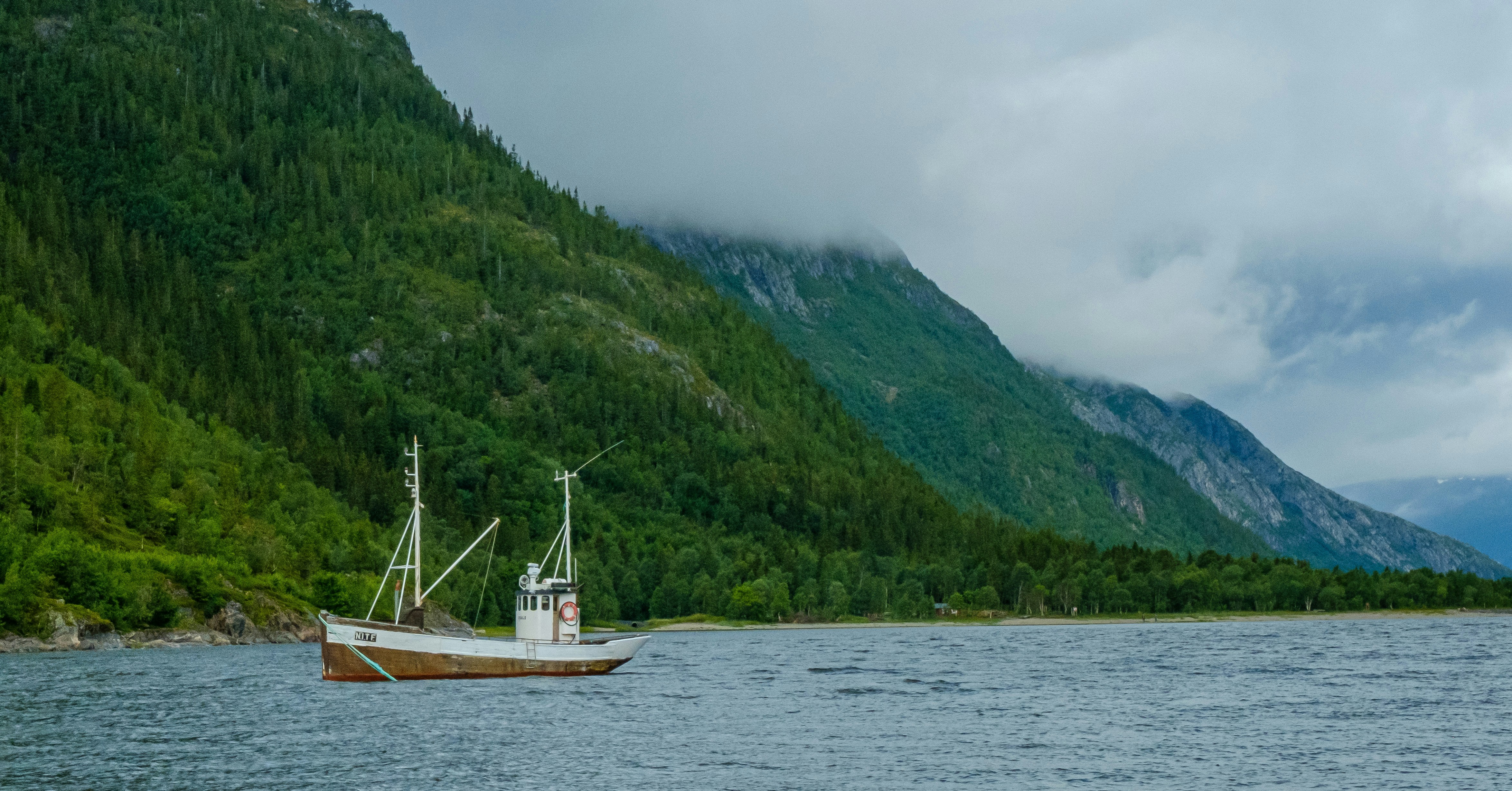 a boat sailing on the water