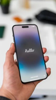 A sleek smartphone displaying the hello ride app contact screen with a glowing send button.