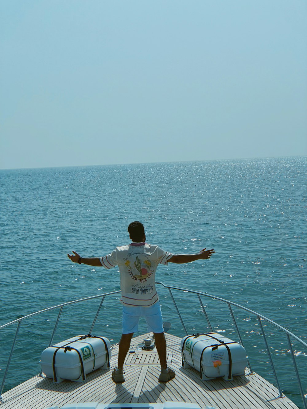 a man standing on a boat