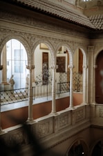 a large ornate building with a large arched staircase