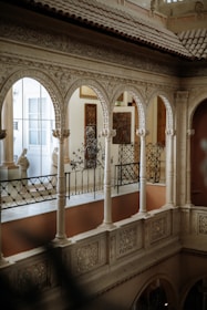 a large ornate building with a large arched staircase