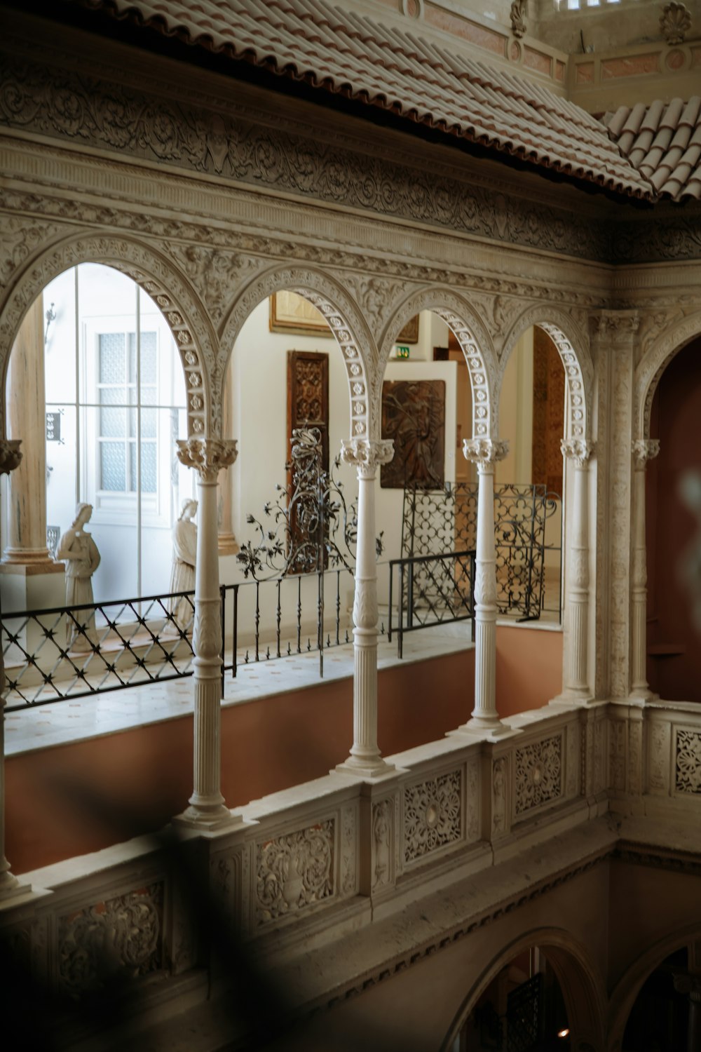 a large ornate building with a large arched staircase