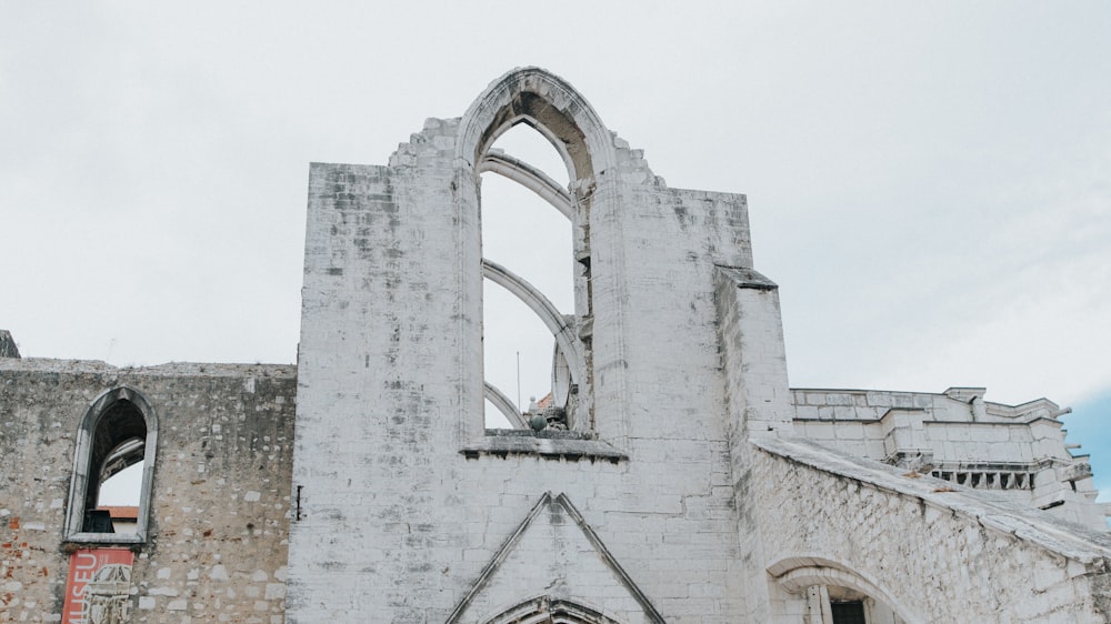 a stone building with arched windows