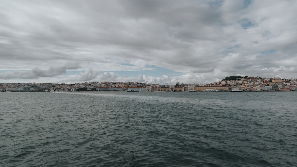 a body of water with buildings along it