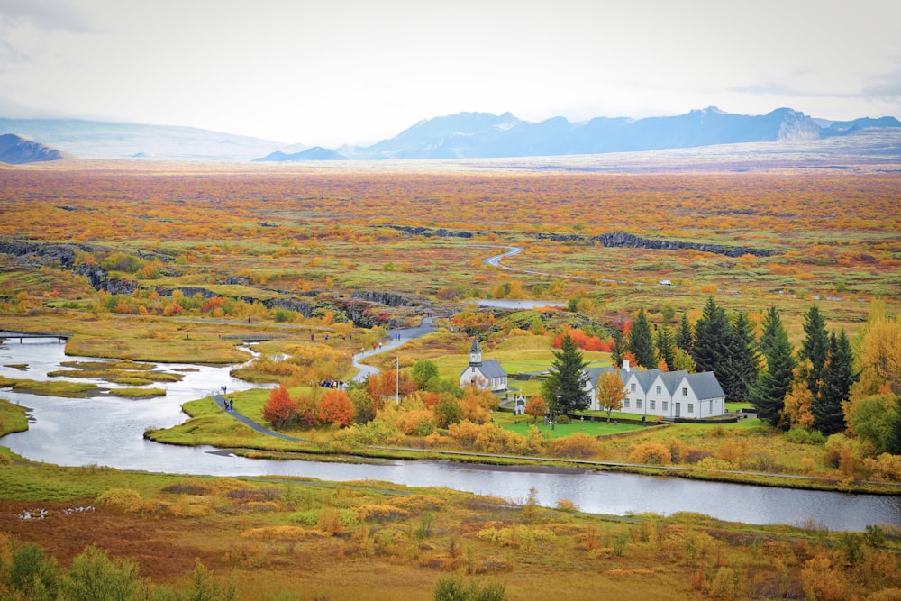 a small white house in a valley