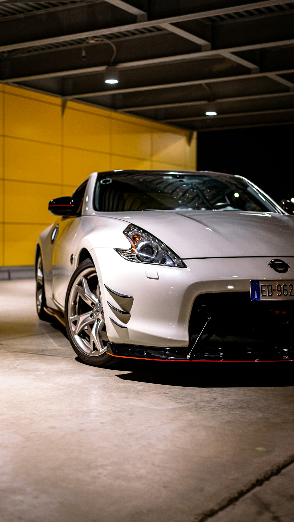 a white car parked in a garage