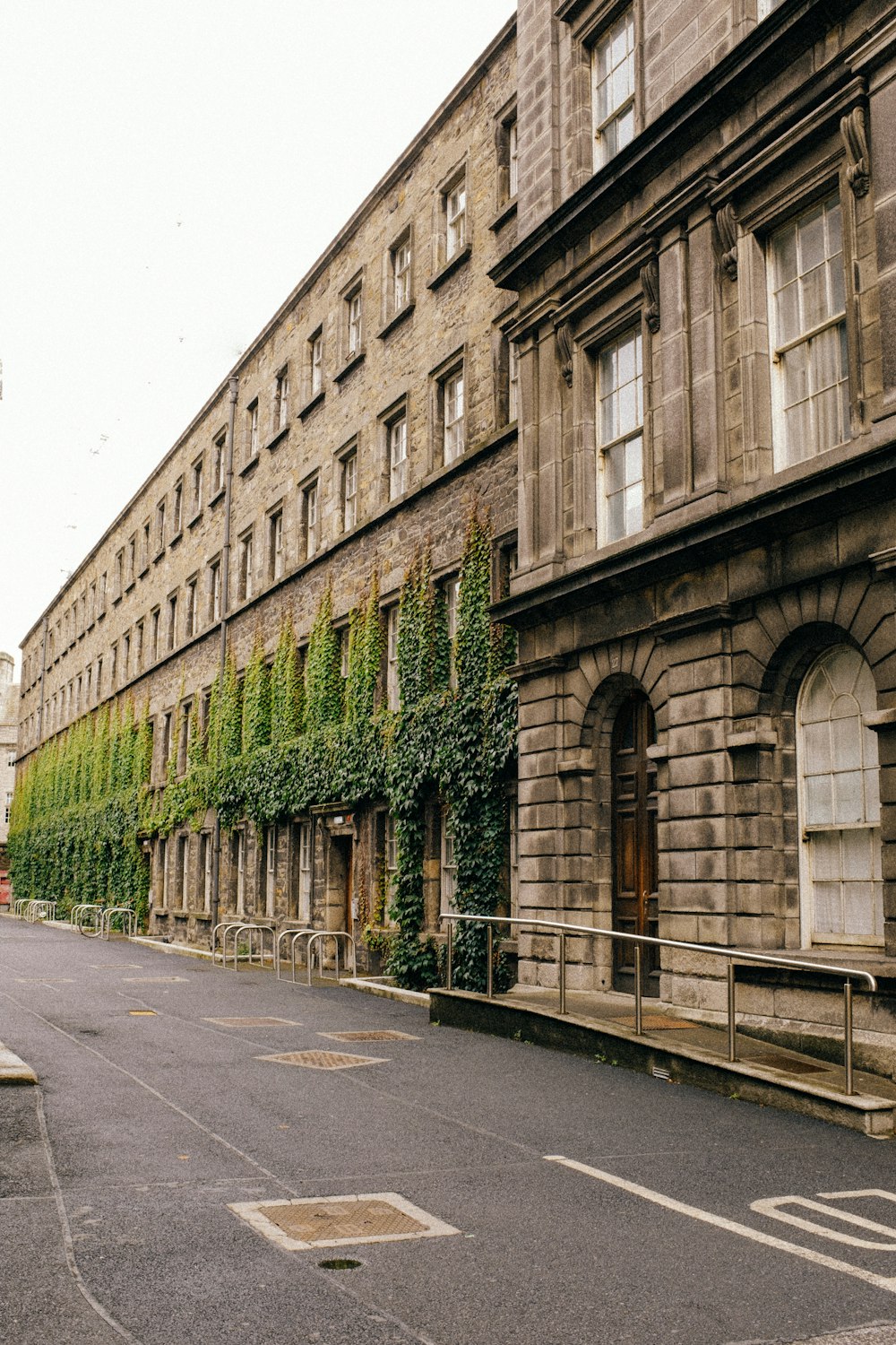 a building with ivy growing on the side