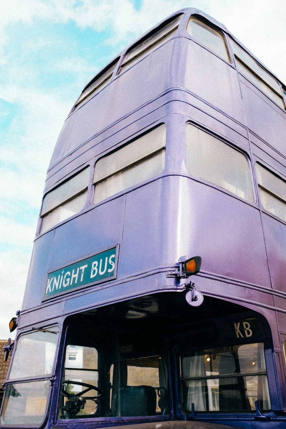 a bus is parked in front of a building