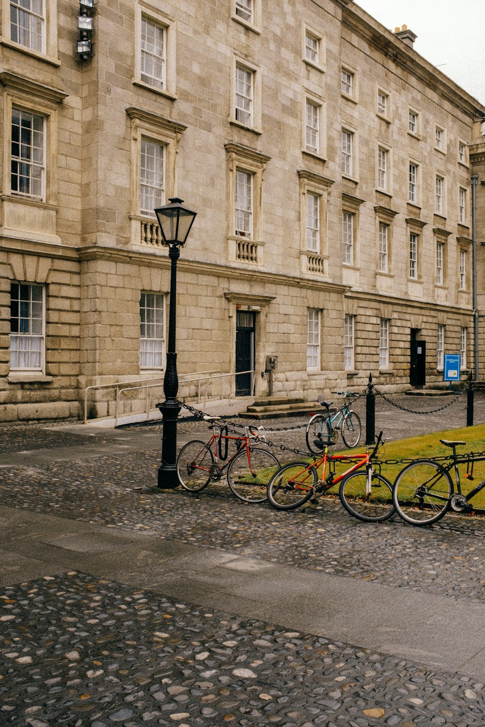 a group of bikes parked outside a building