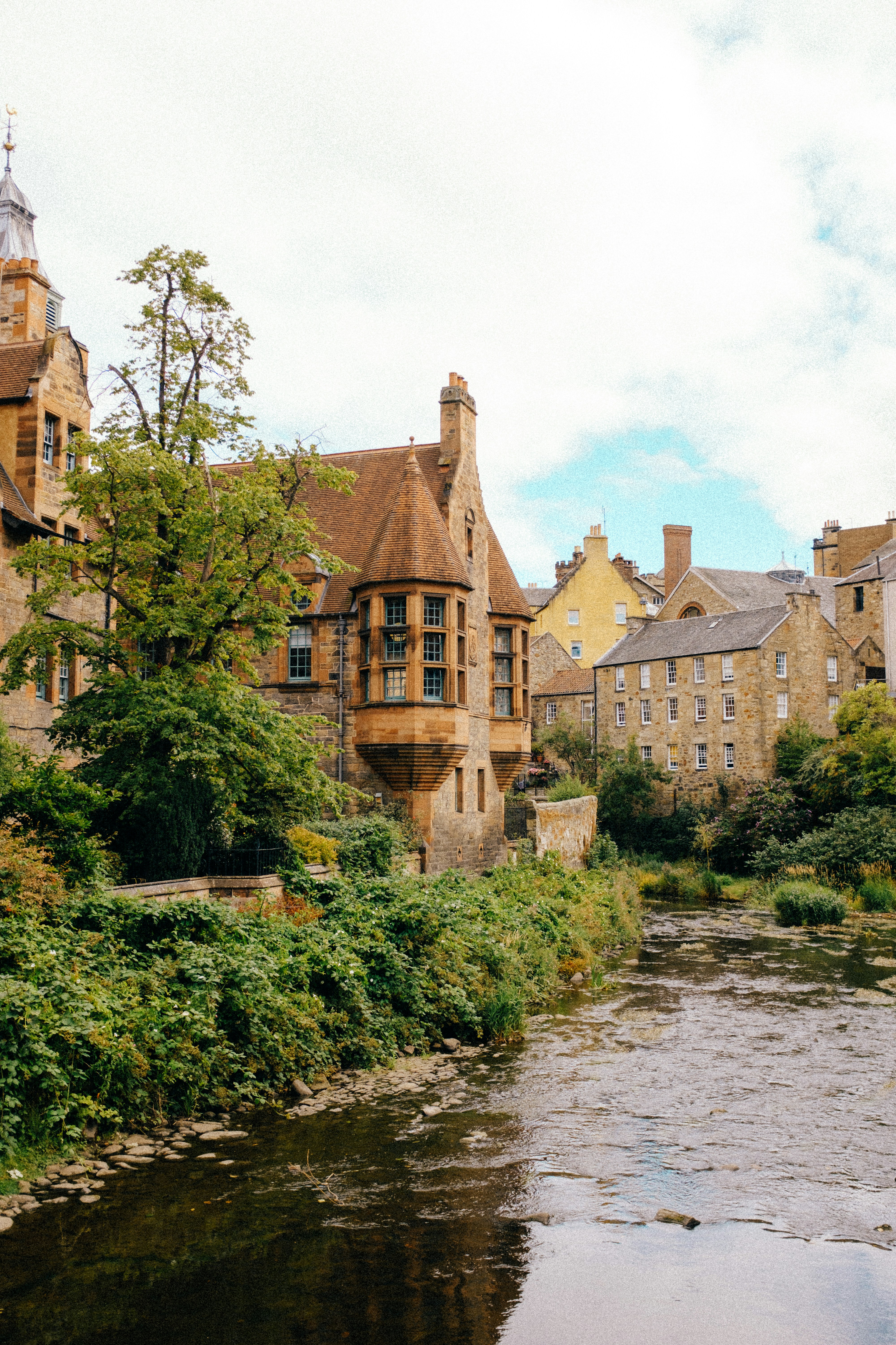 a river with buildings along it