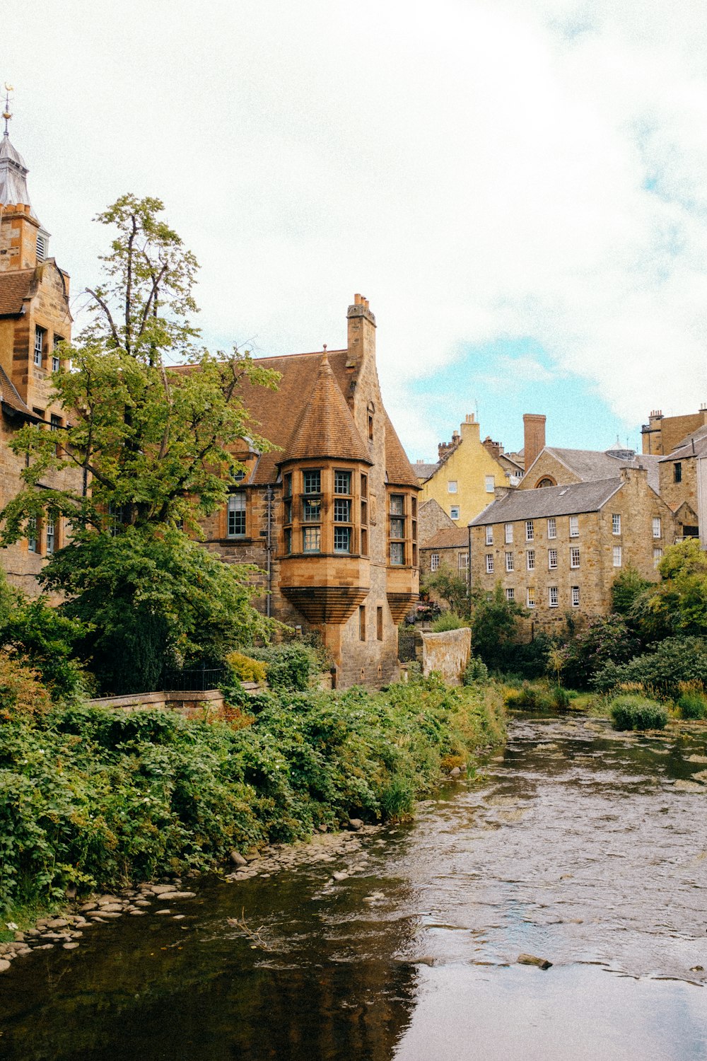 a river with buildings along it