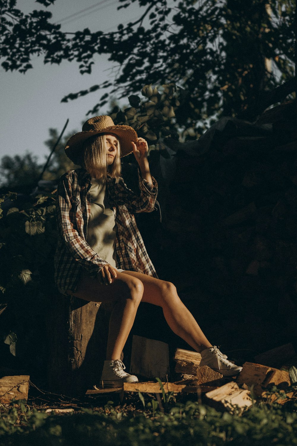 a person sitting on a log