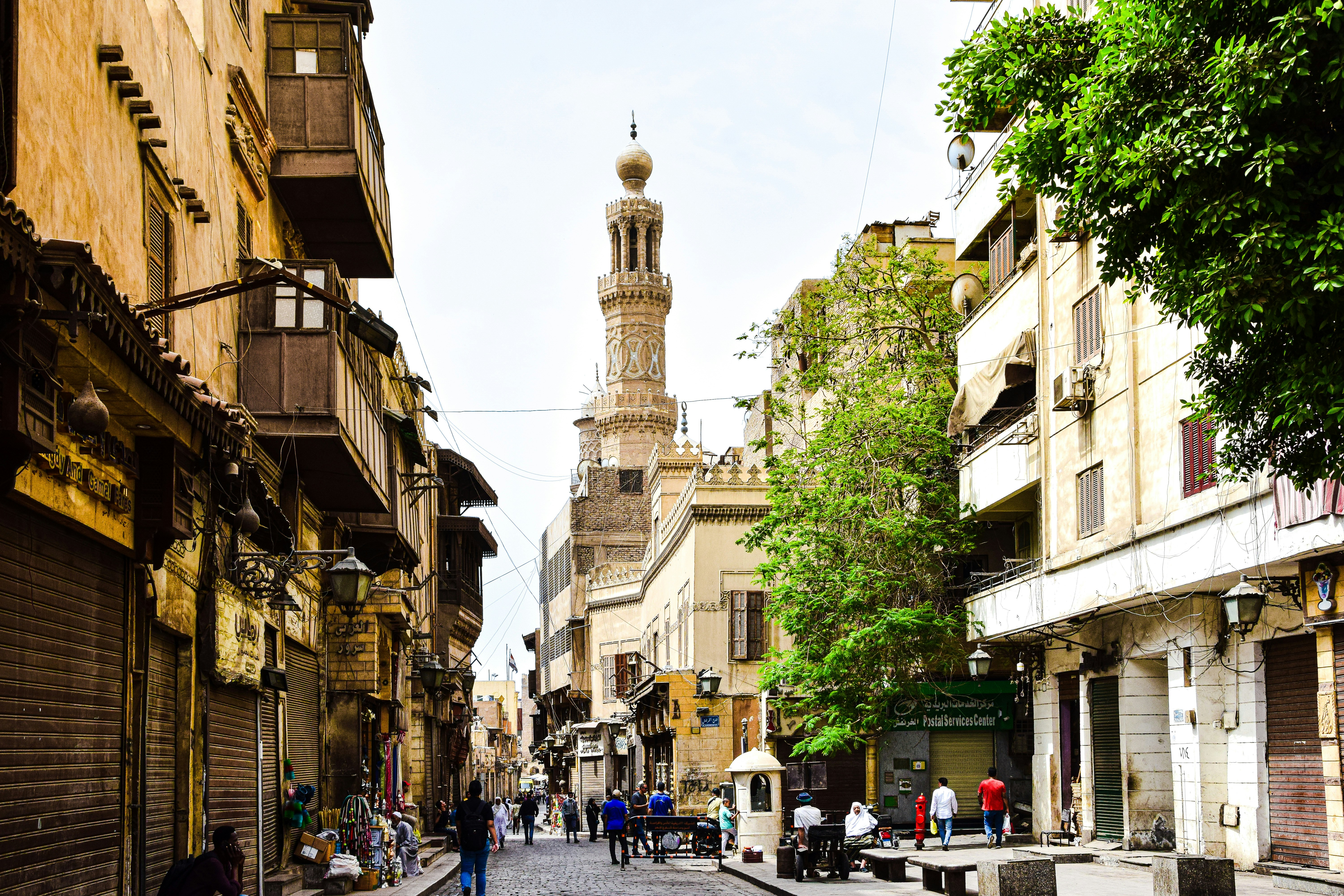 a street with buildings and people, Cairo, Egypt.