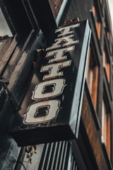 A vintage storefront sign from 1967 with classic typography.
