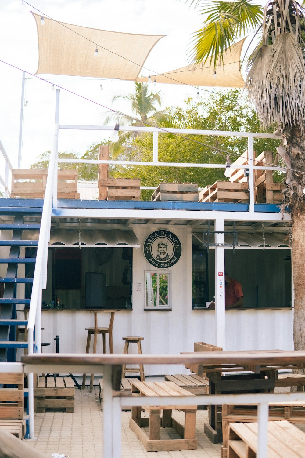 a building with tables and chairs outside