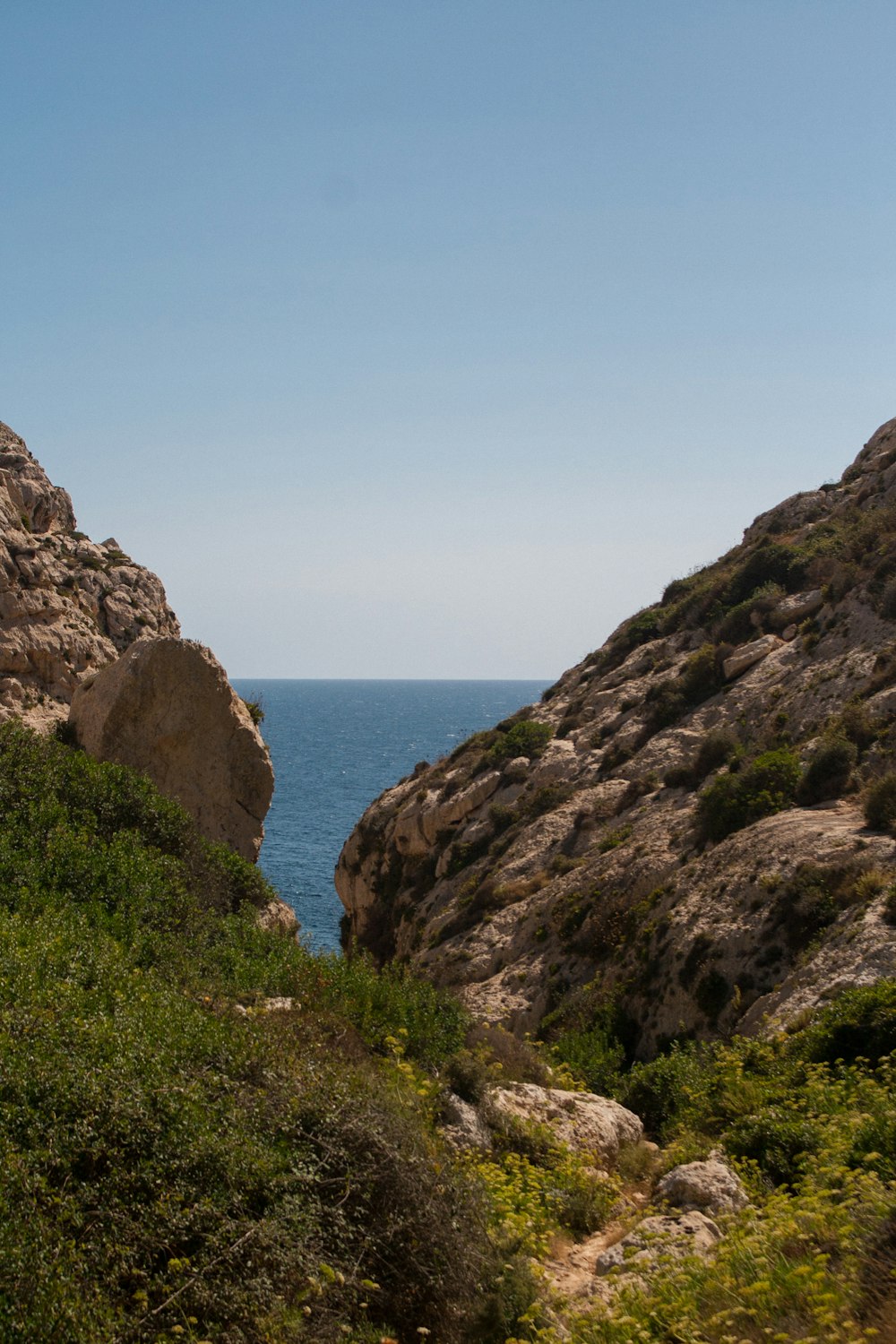 a rocky cliff overlooking the ocean