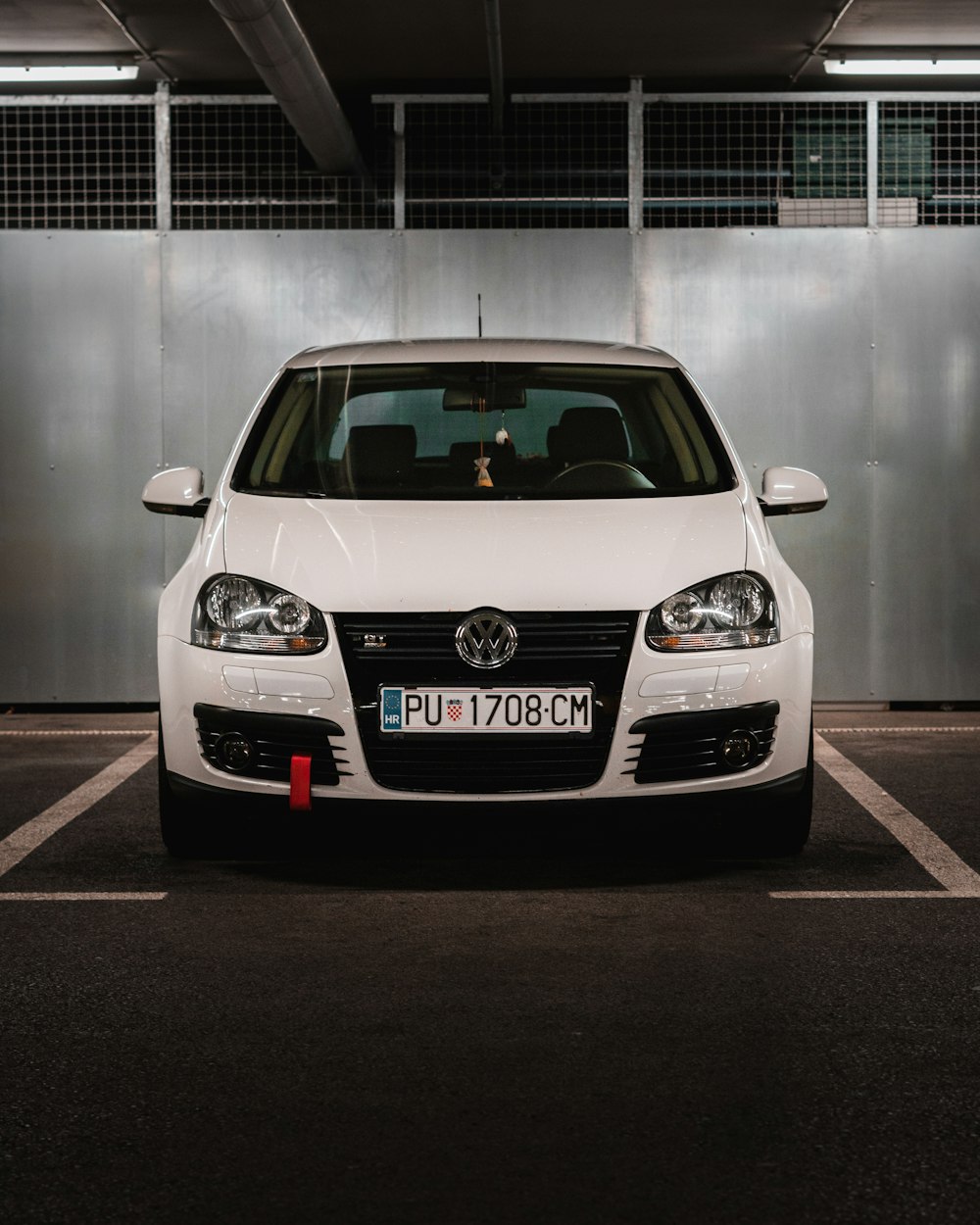 a car parked on the side of a building