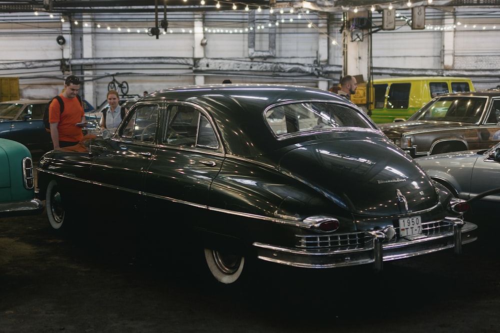 a black car parked in a garage