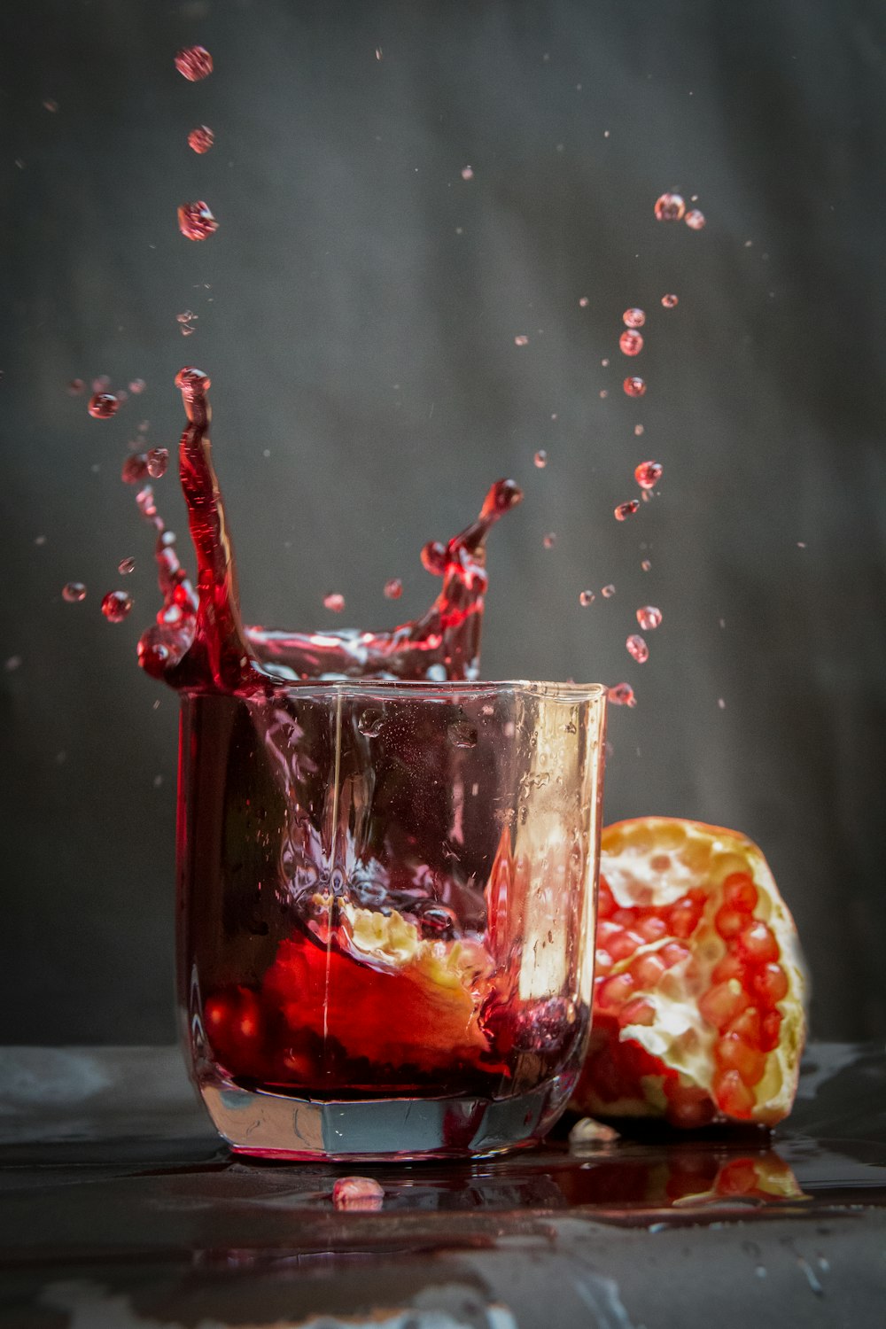 a glass with water splashing