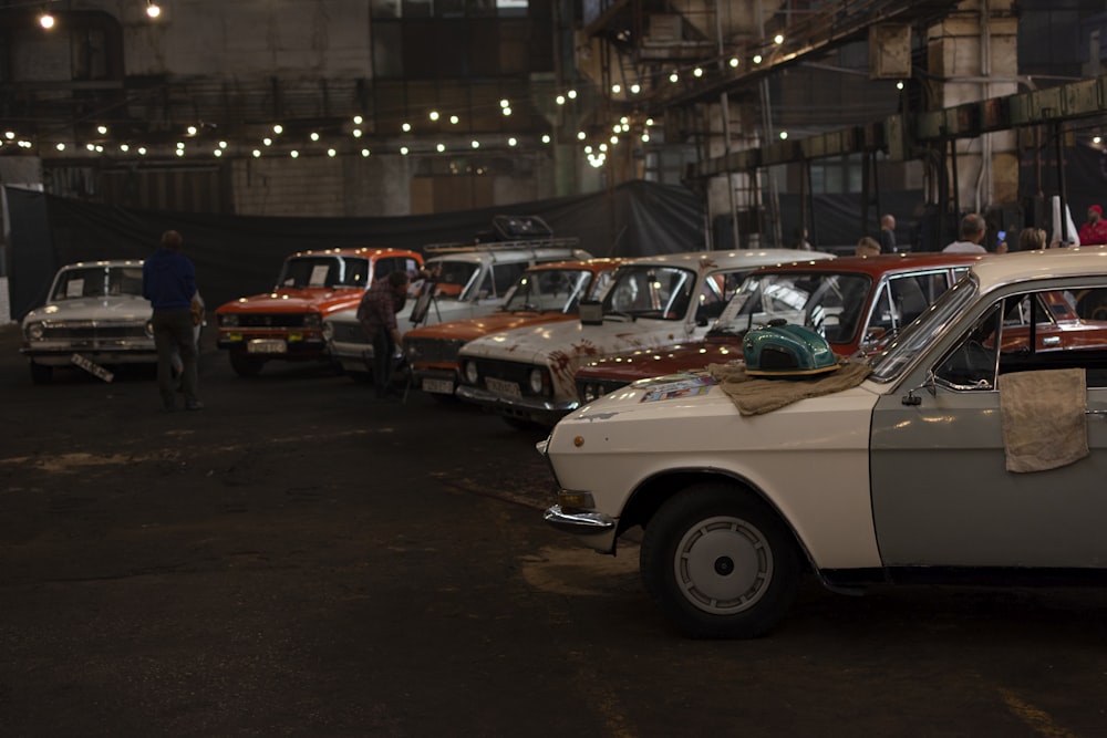 a group of cars parked in a parking lot