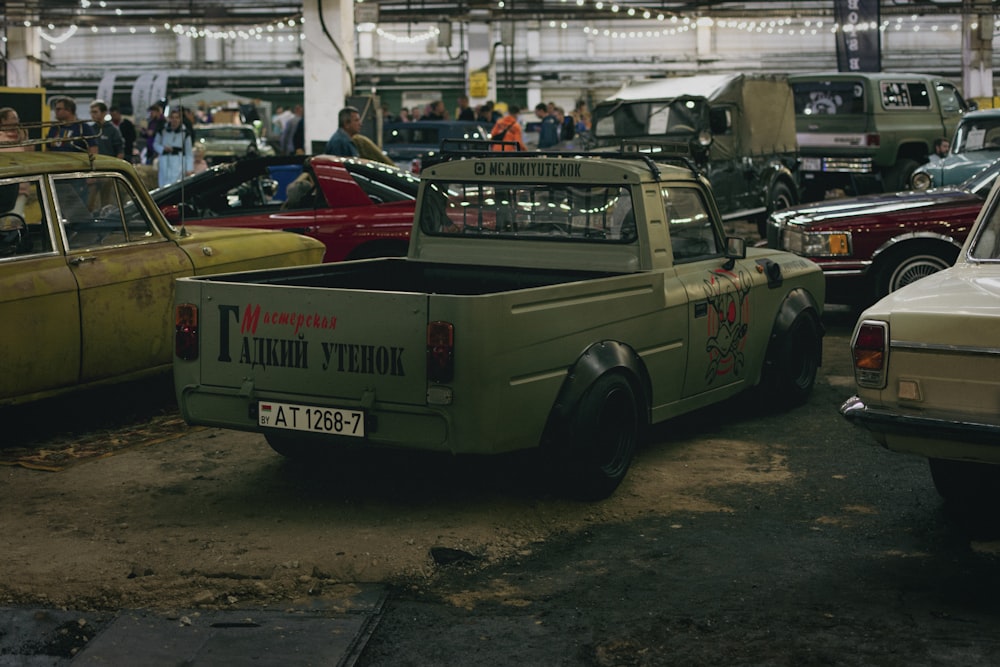 a group of cars parked in a parking lot