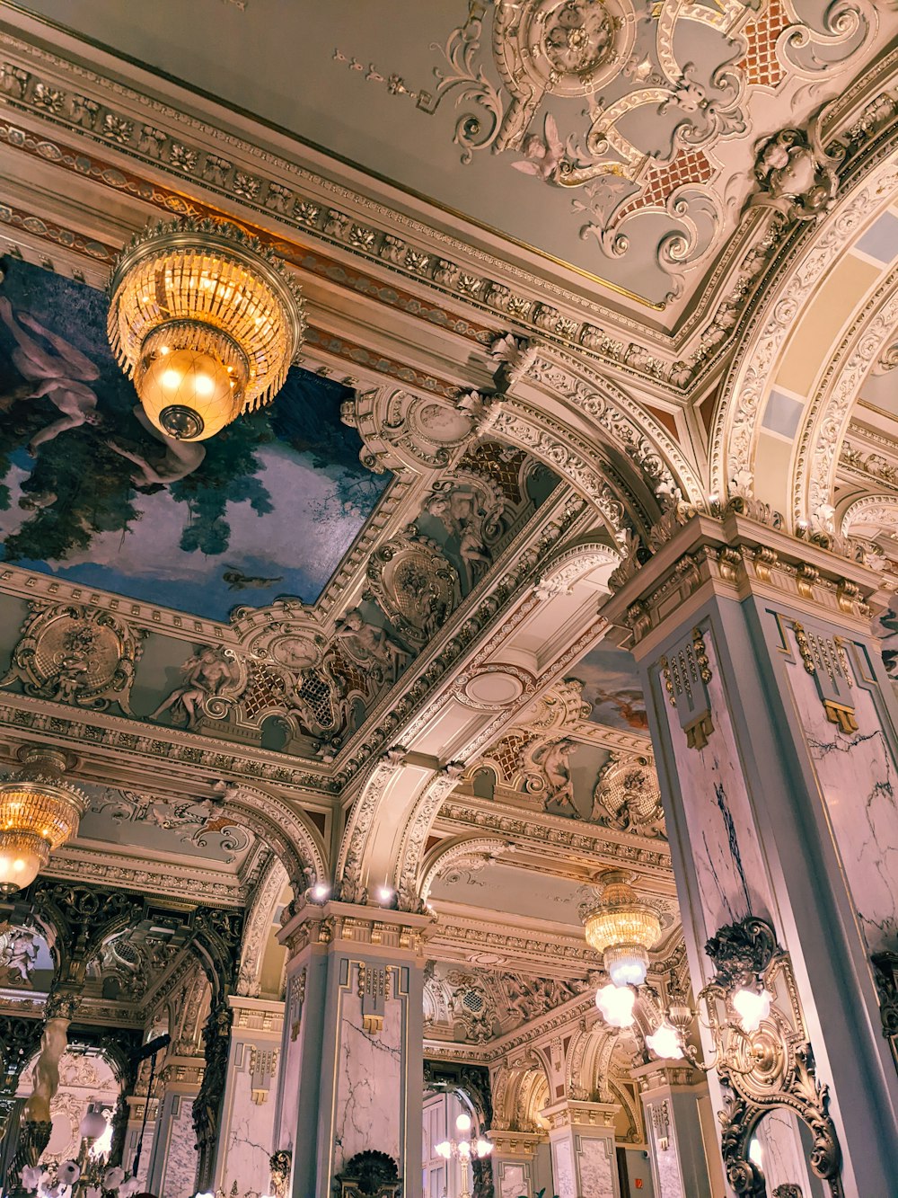 a chandelier from the ceiling of a building