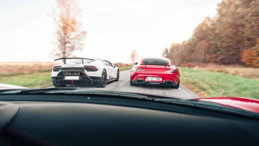 a couple of cars on a road