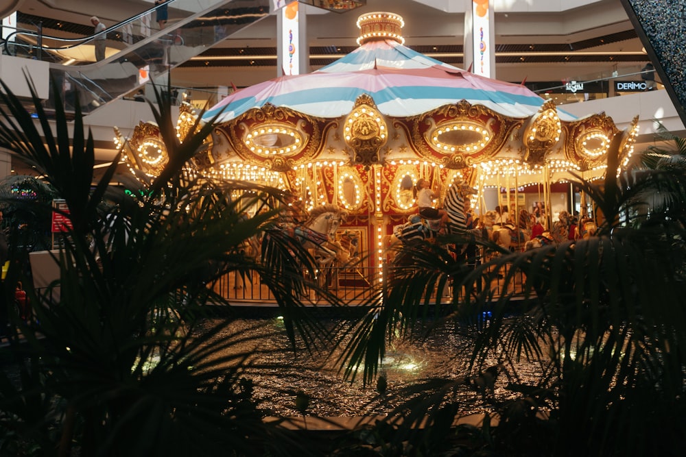 a large carousel in a mall