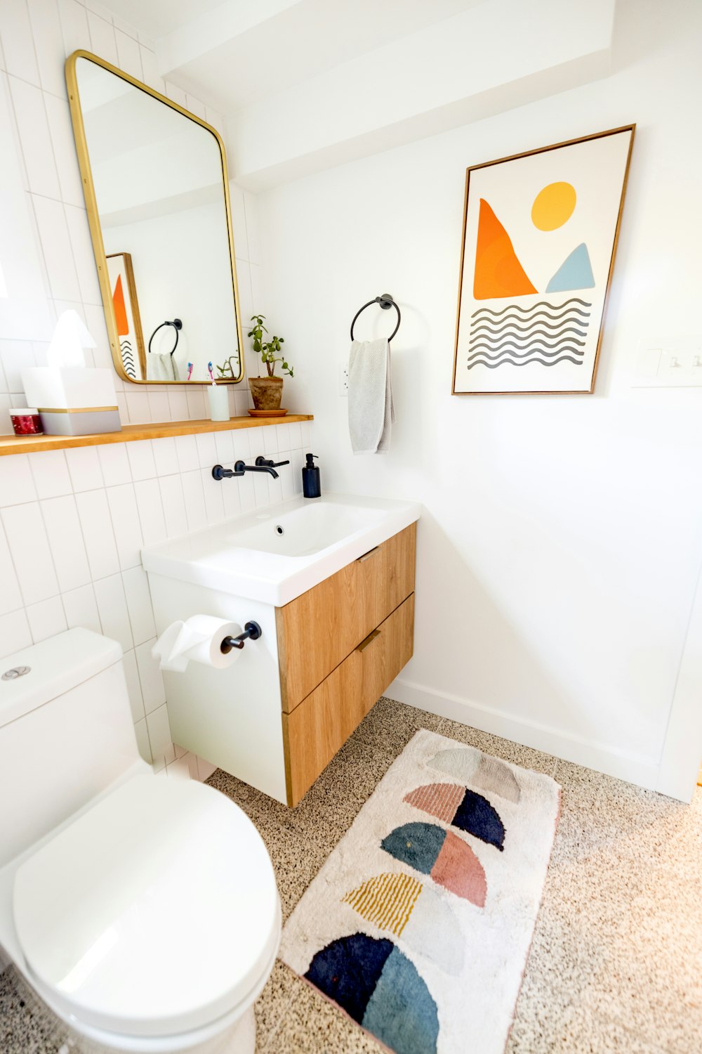 a bathroom with a toilet and sink