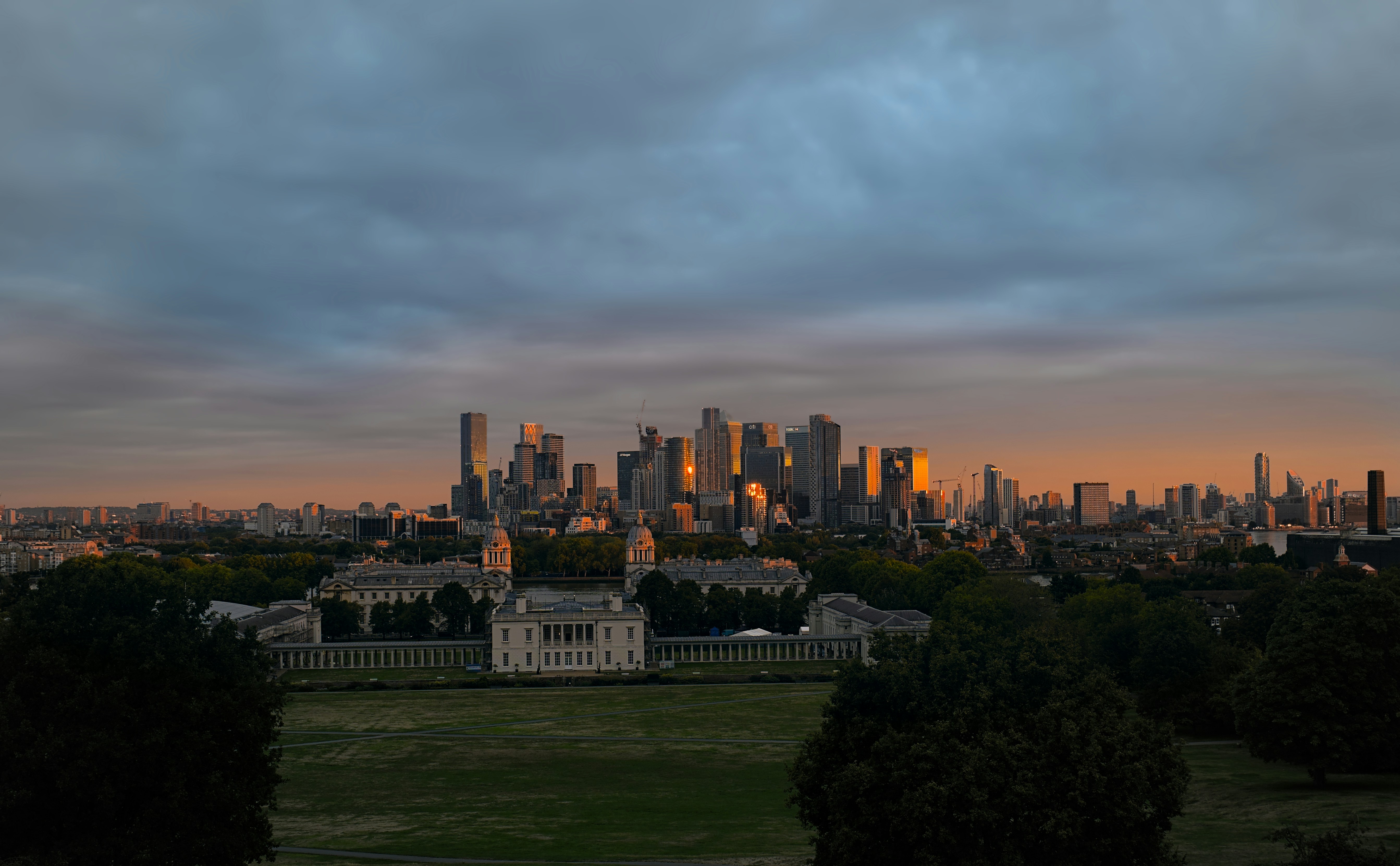 A city skyline with a body of water in front of it photo – Free City ...