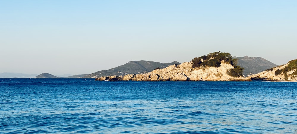 a body of water with land in the distance