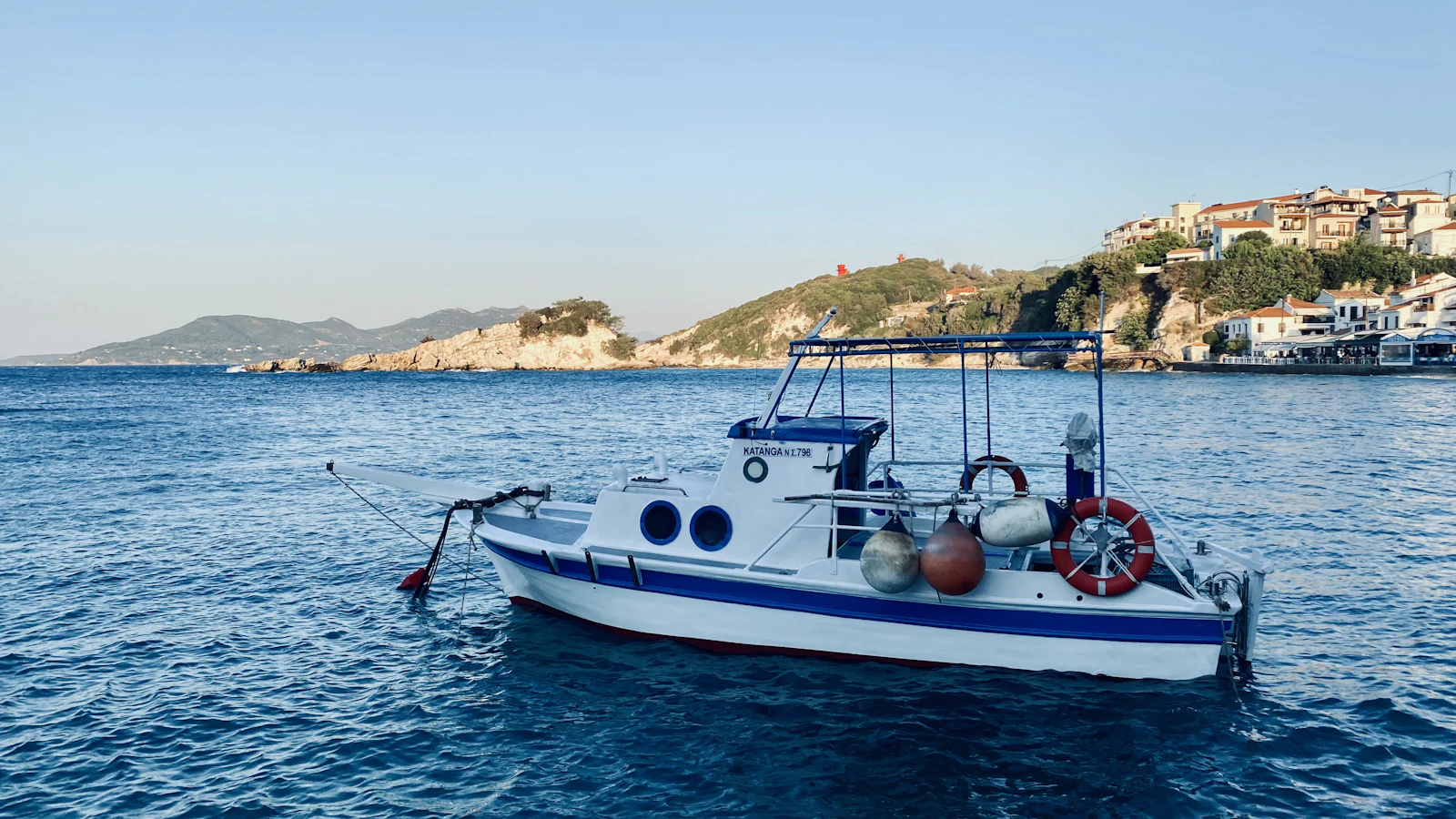 A fishing boat on clear water off the coast of Samos