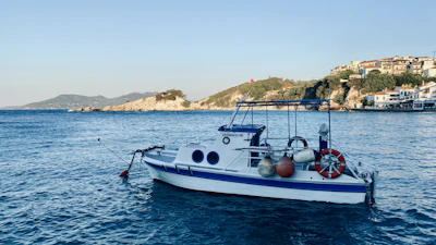A fishing boat on clear water off the coast of Samos