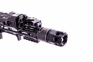 A hands-on moment showing a user inspecting an AR-15 barrel before installation