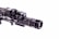A close-up view of a firearm accessory with detailed engravings and mounted components, showcasing intricate metalwork and a tactical design.
